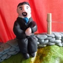 A fondant husband sitting on the dry-stone wall waiting for a fondant me...